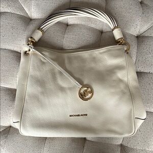 Michael Kors Cream Hand Bag with Twist Strap Design and Gold Accents